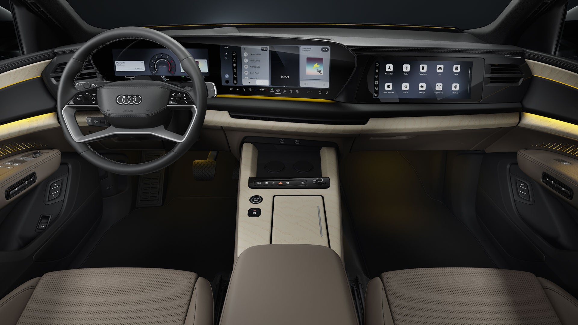 View from the back seat into the cockpit of the Audi Q9 SUV. In the foreground are the steering wheel and the panoramic displays featuring the Audi Virtual Cockpit and the MMI display.