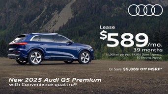 Side view of an Audi Q5 parked.