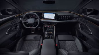 Interior of the 2025 Audi Q5 from the backseat view.