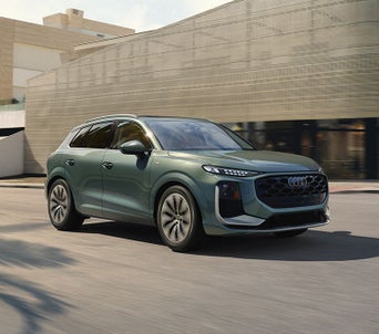 The All-New 2026 Q3 parked in driveway