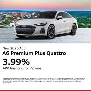 Side view of an Audi parked.