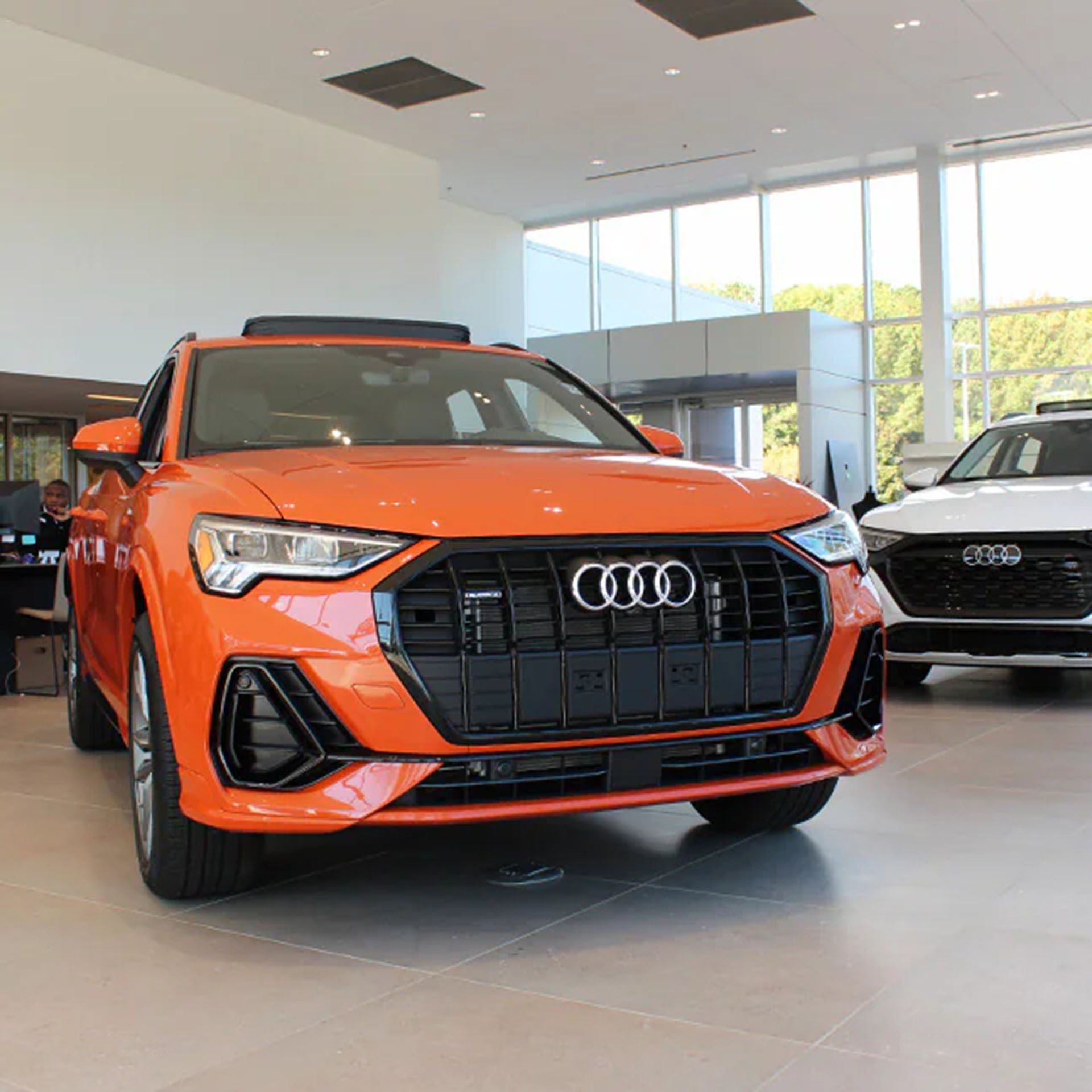Left profile view of an Audi q8 vehicle parked.