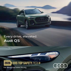 Front view of an Audi Q5 driving.