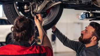 Service advisor servicing a vehicle