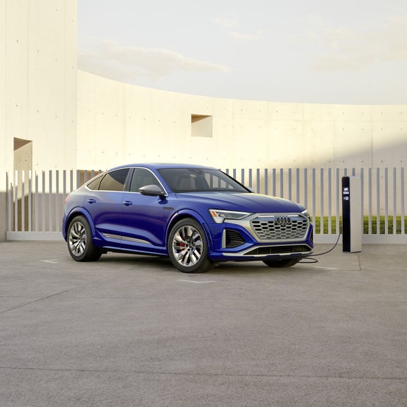 Three-quarter side view of an Audi SQ8 e-tron Sportback.