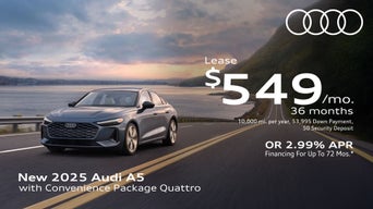 Side view of an Audi A5 driving