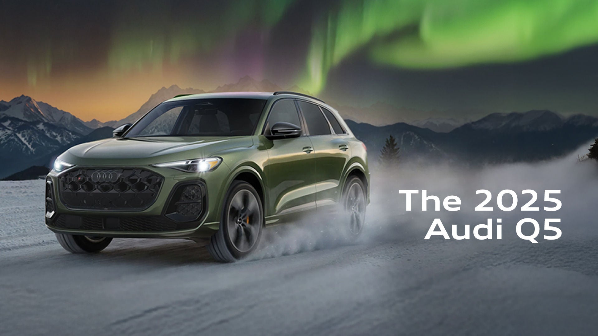 The Audi Q5 driving under northern lights in snow