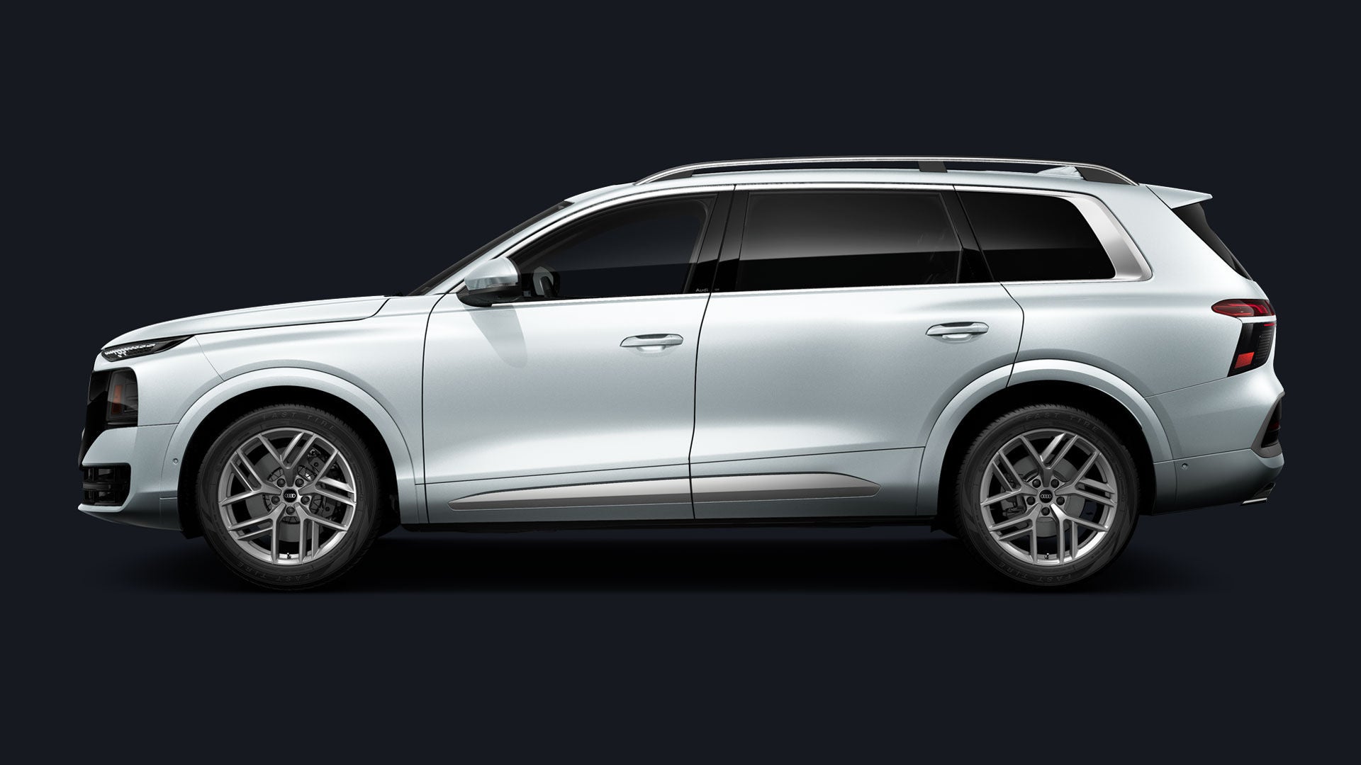 Side-view of a white Audi Q9.