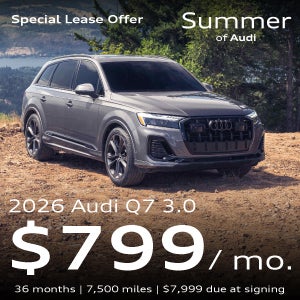 An Audi Q7 SUV parked.