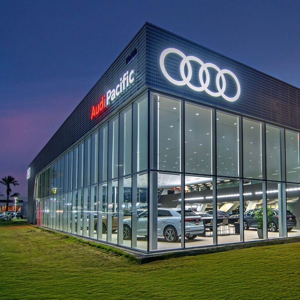 Left side profile view of an Audi S6 parked.