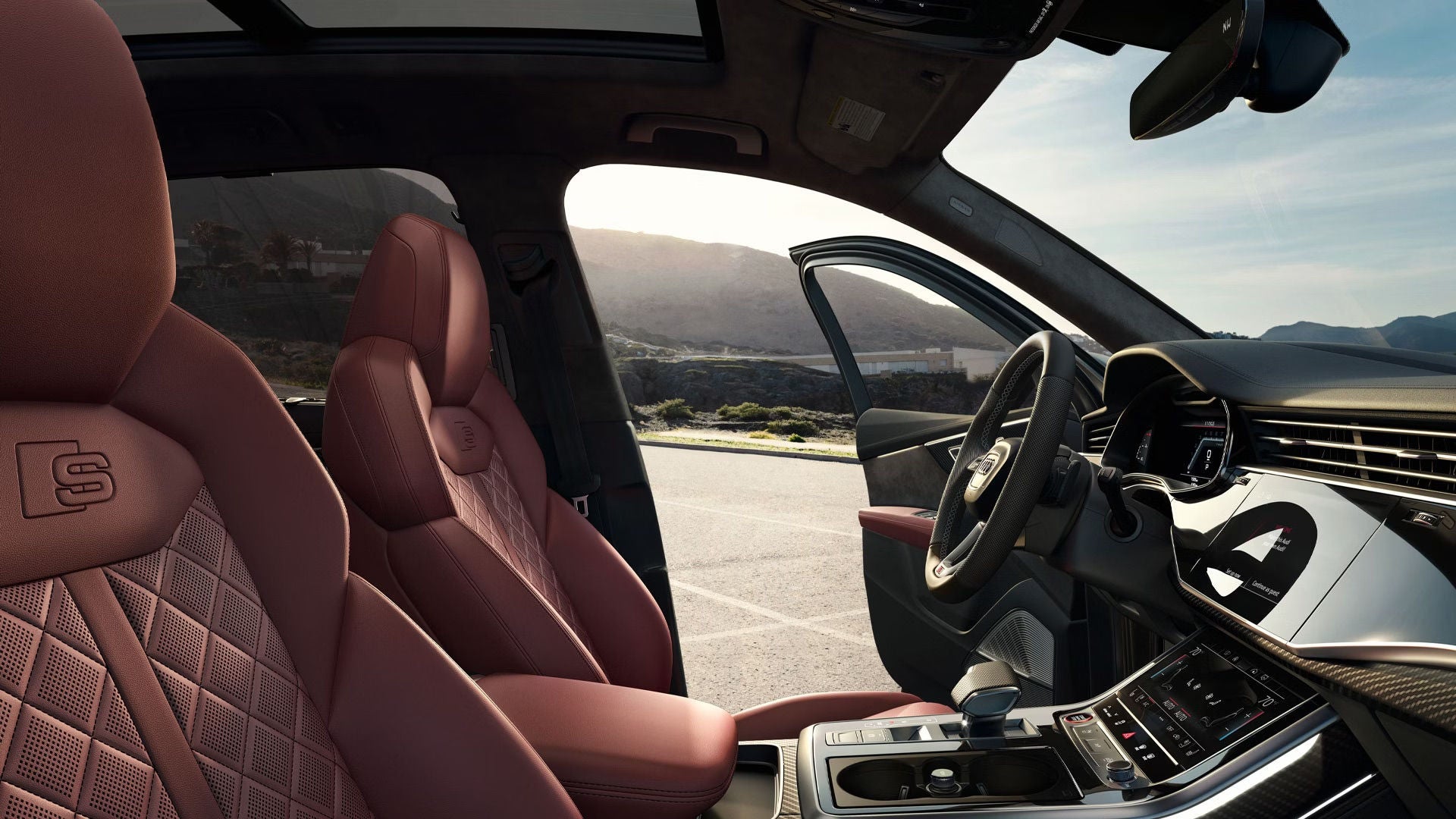 2026 Audi SQ7 interior showin with red leather and front doors open