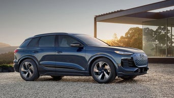 Front side view of an Audi Q6 e-tron parked.