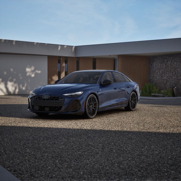 Front 3/4 view of the Audi A6 Sedan. 