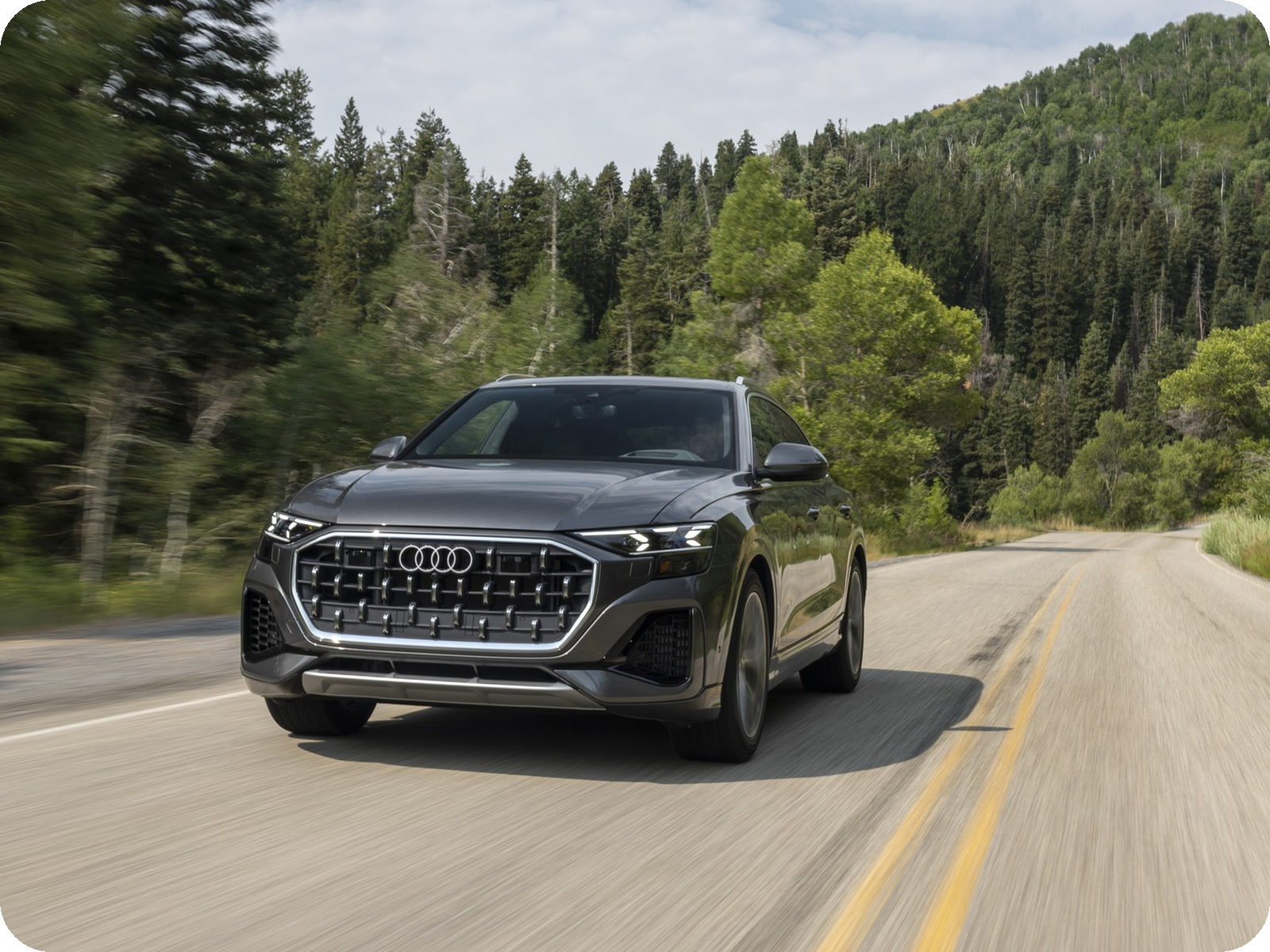 Audi Q8 in Samurai Grey — flagship coupe-SUV.