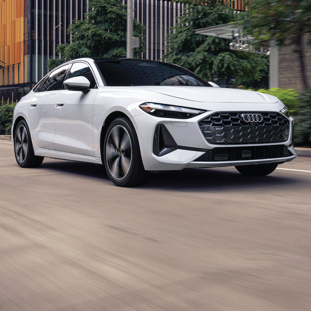 Right profile view of an Audi Q8 e-tron parked.