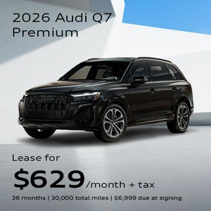 Side angled profile of 2026 Audi Q7 Premium parked
