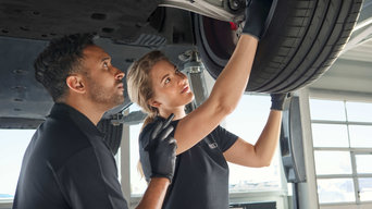 audi worker working on a car 