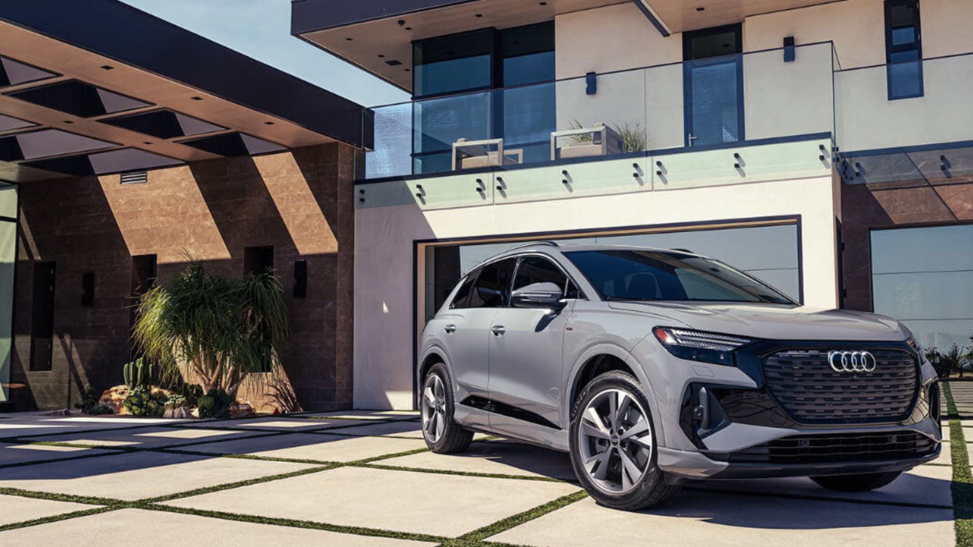 2025 Audi Q4 e-tron Exterior In Modern Home Driveway
