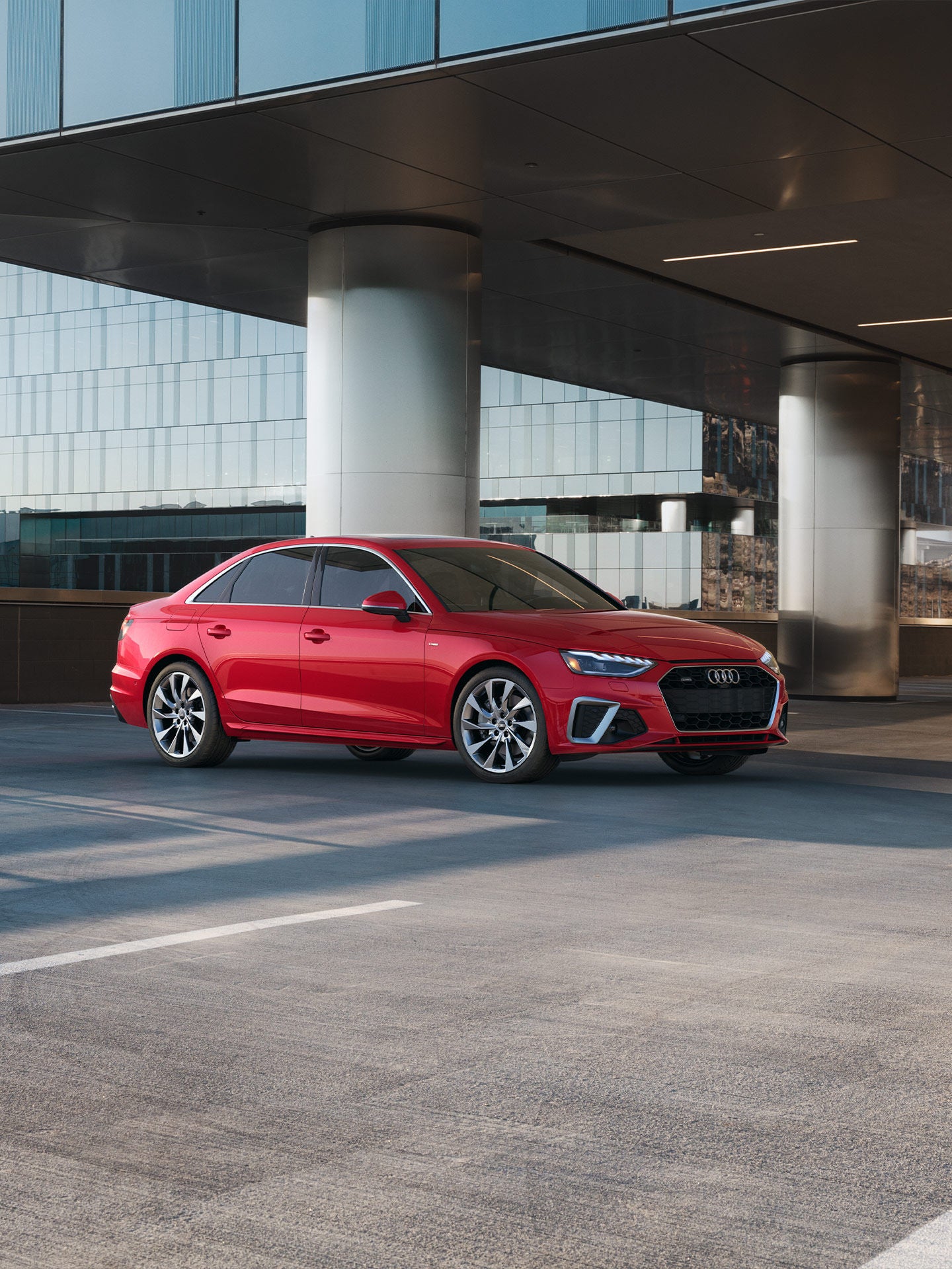 Three-quarter front view of the Audi A4 Sedan. 