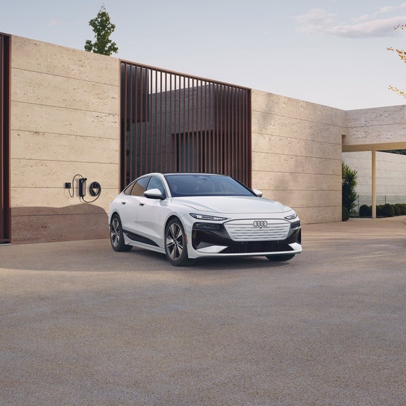 3/4 front view of the Audi A6 Sportback e-tron charging.