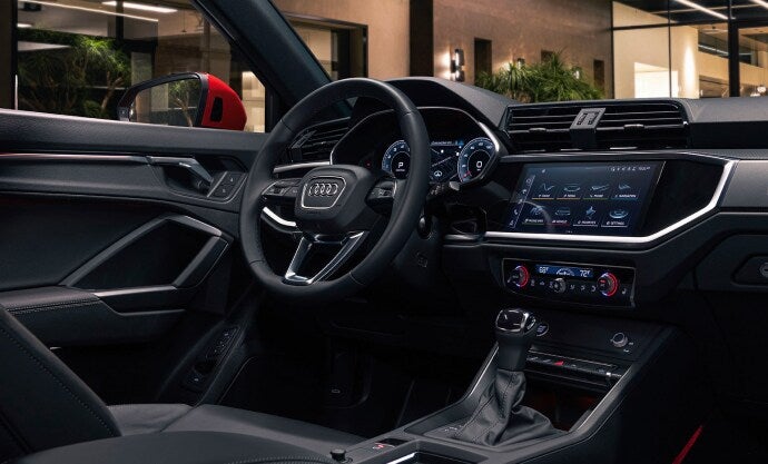 WIRELESS FRONT CHARGER AND REAR SEAT USB PORTS