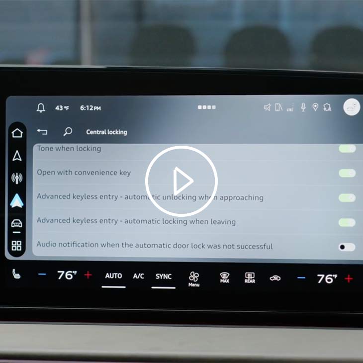Close-up on an iPhone resting on the middle console of the Audi Q3.