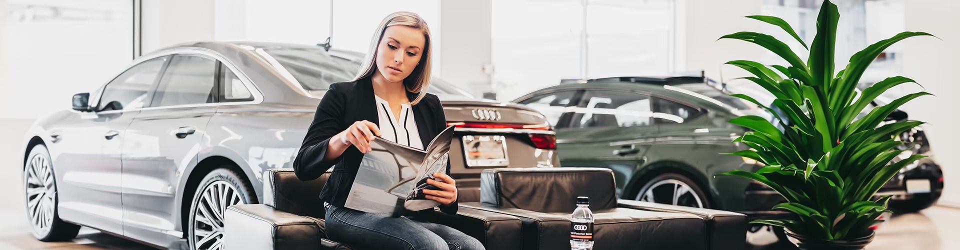 Three quarter view of an Audi Q8 SUV parked.