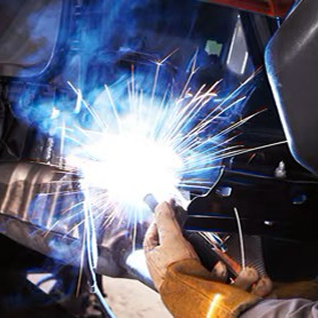 Three quarter view of an Audi Q8 SUV parked.