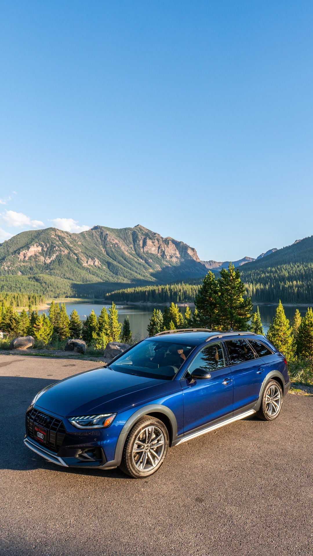 Three quarter-view of an Audi vehicle parked.