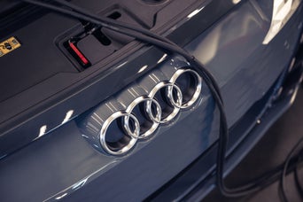 under hood of Audi in service