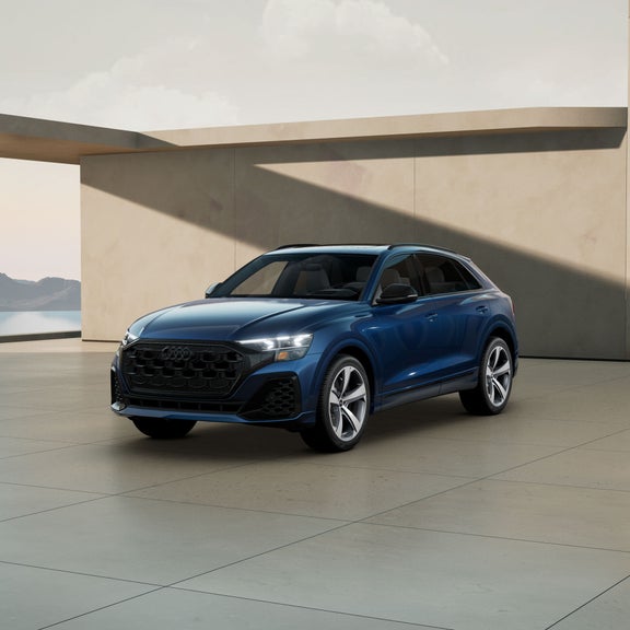 Three quarter front profile of the Audi SQ8 parked.