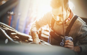 Car technician working on a car