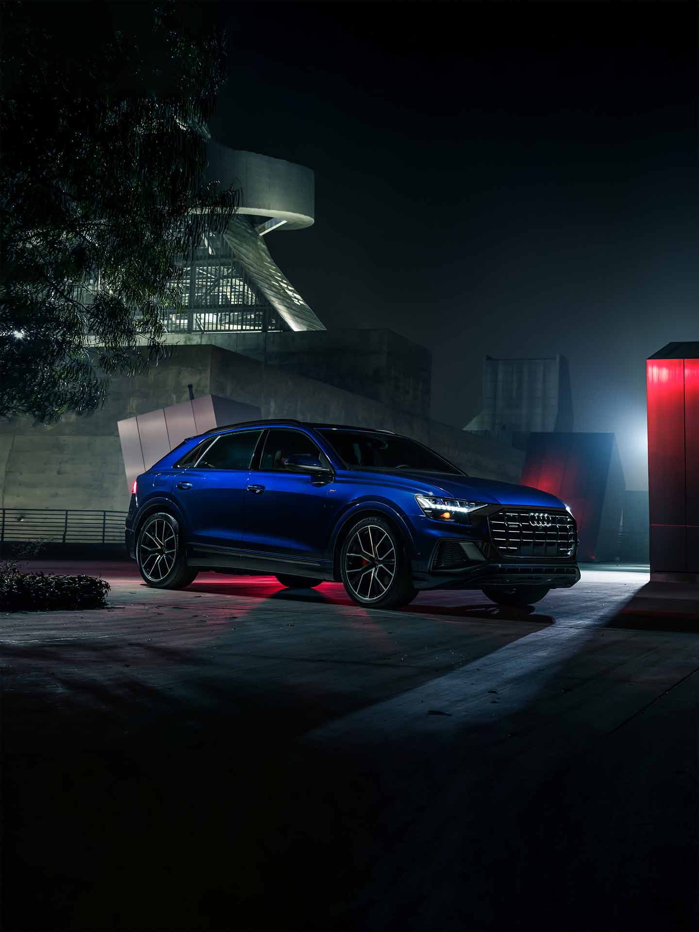 Three-quarter front view of the Audi Q8.