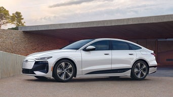 Front side view of an Audi A6 e-tron parked