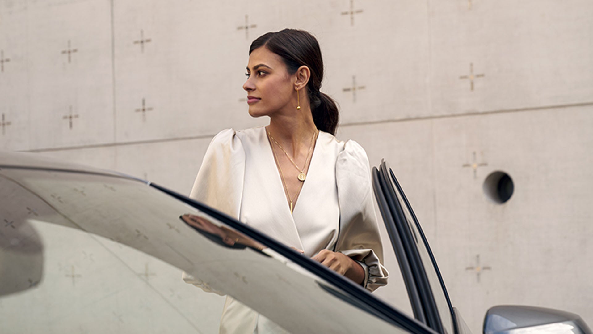 Audi customer entering the driver's side of an Audi.