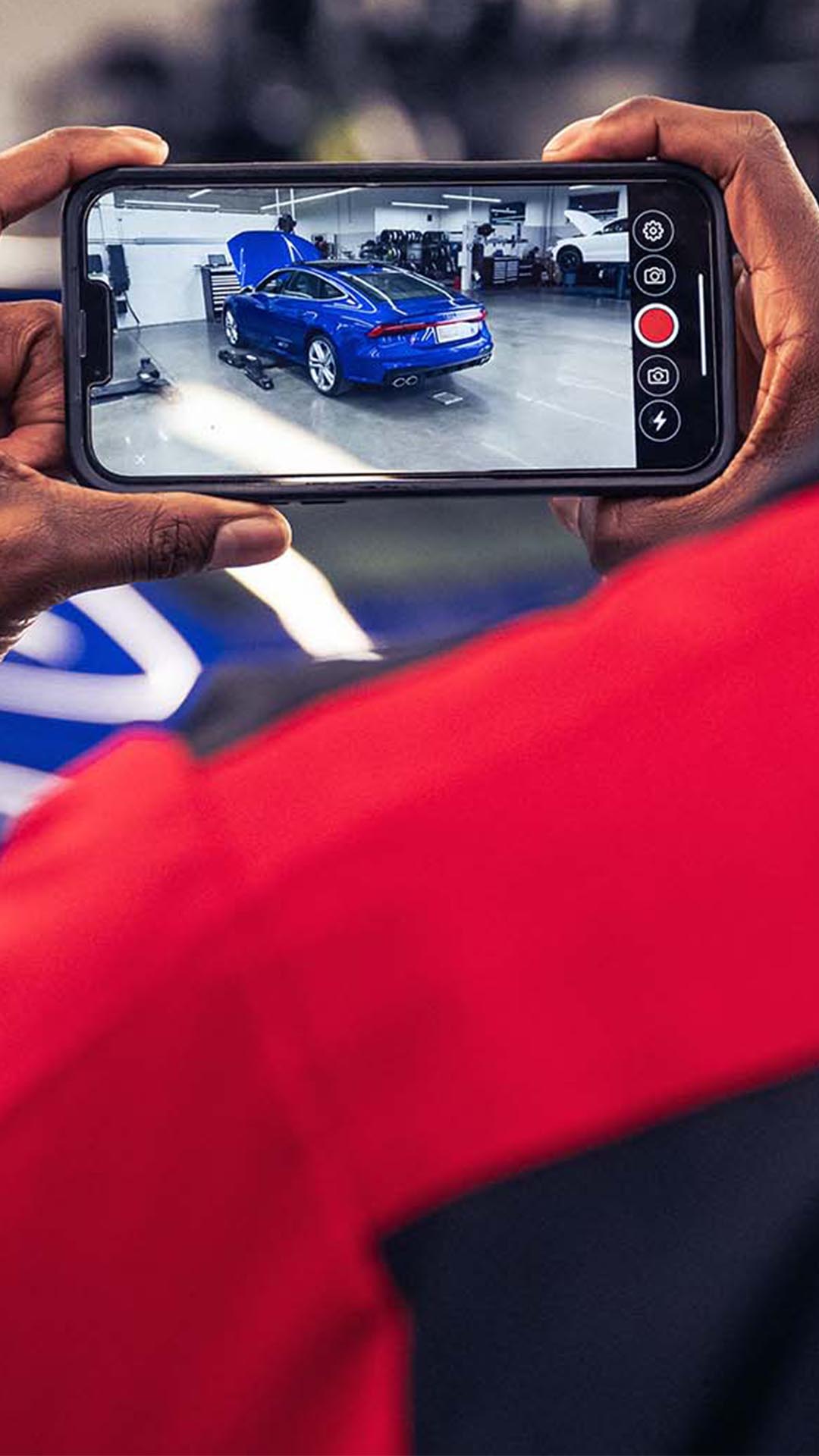 Rear profile view of an Audi Q5 parked.