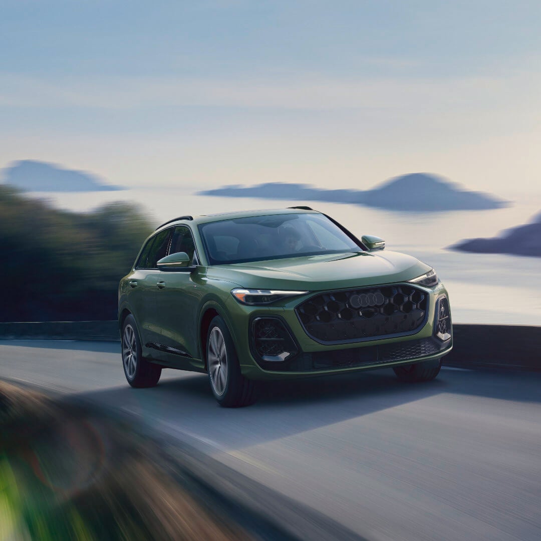 2026 Audi Q5 Exterior Driving On Misty Turn