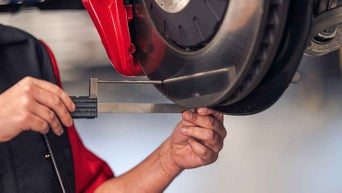 Technician is serving vehicle.