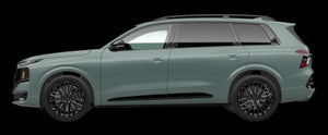 Side profile of the 2027 Audi Q9 in Agave Green.