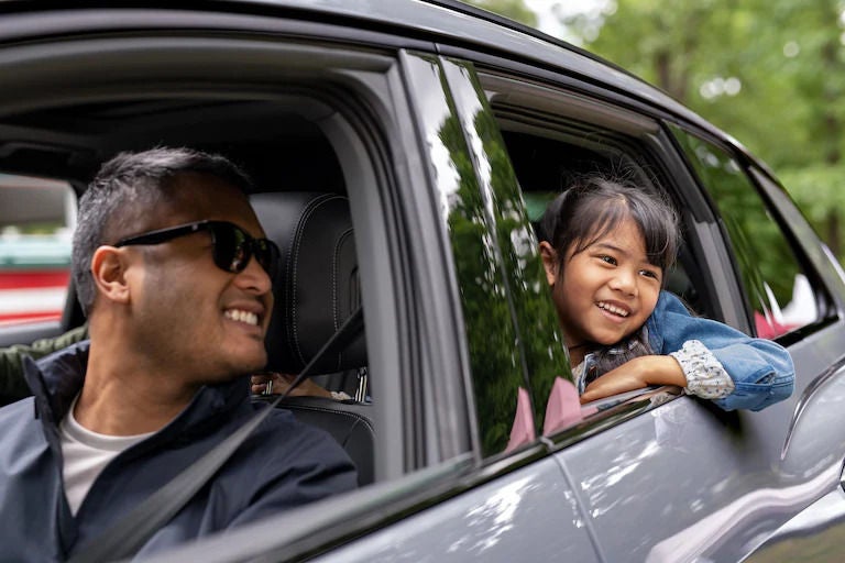 Family going on a trip in Audi Car