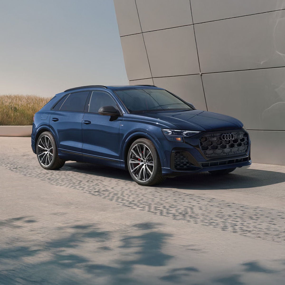 Three quarter front view of the Audi Q8. 