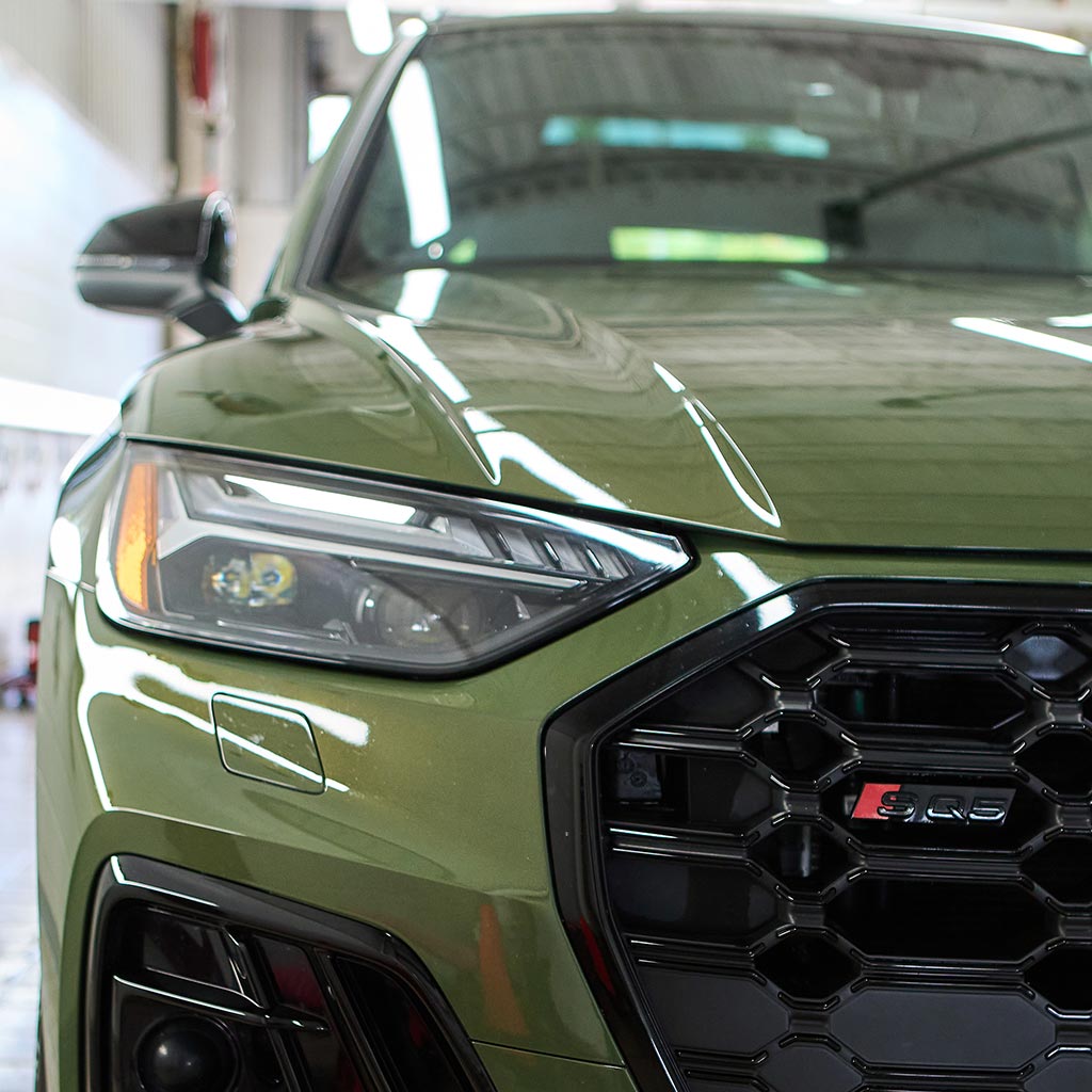 Close-up view of the front of an Audi vehicle.