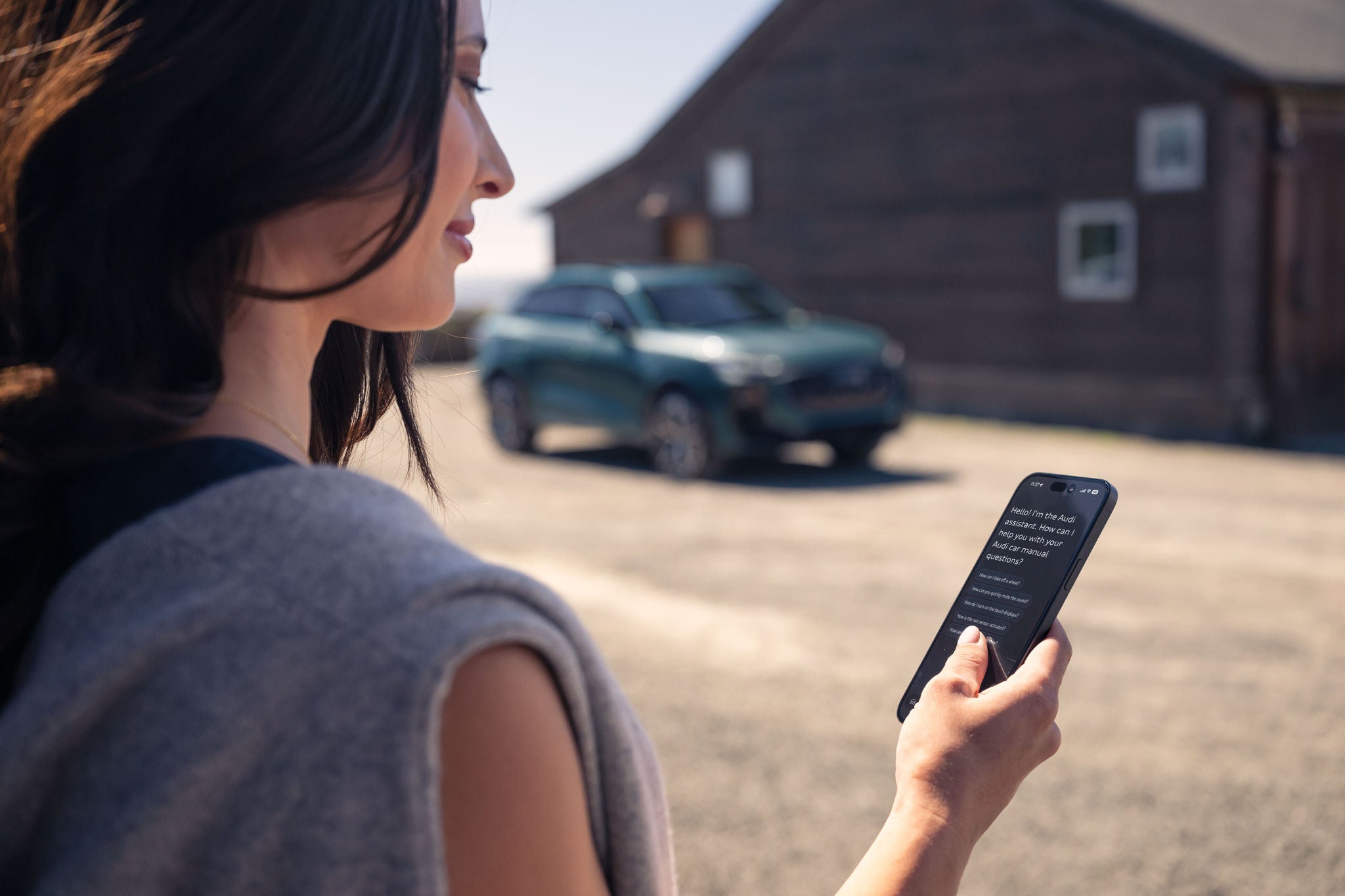 image of myaudi app with q3 in background