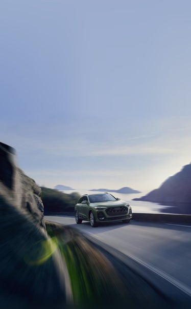 2026 Audi Q5 driving through a canyon