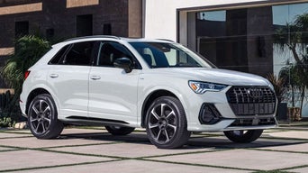 Front side of a 2025 Audi Q3 parked.