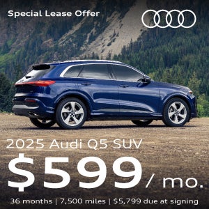 A blue Q5 parked.