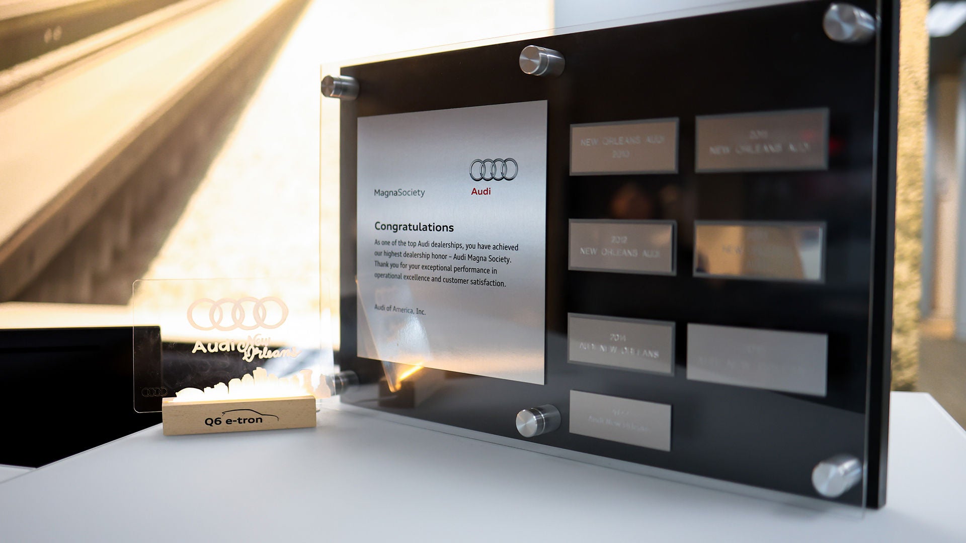 Three quarter view of an Audi q7 vehicle parked.