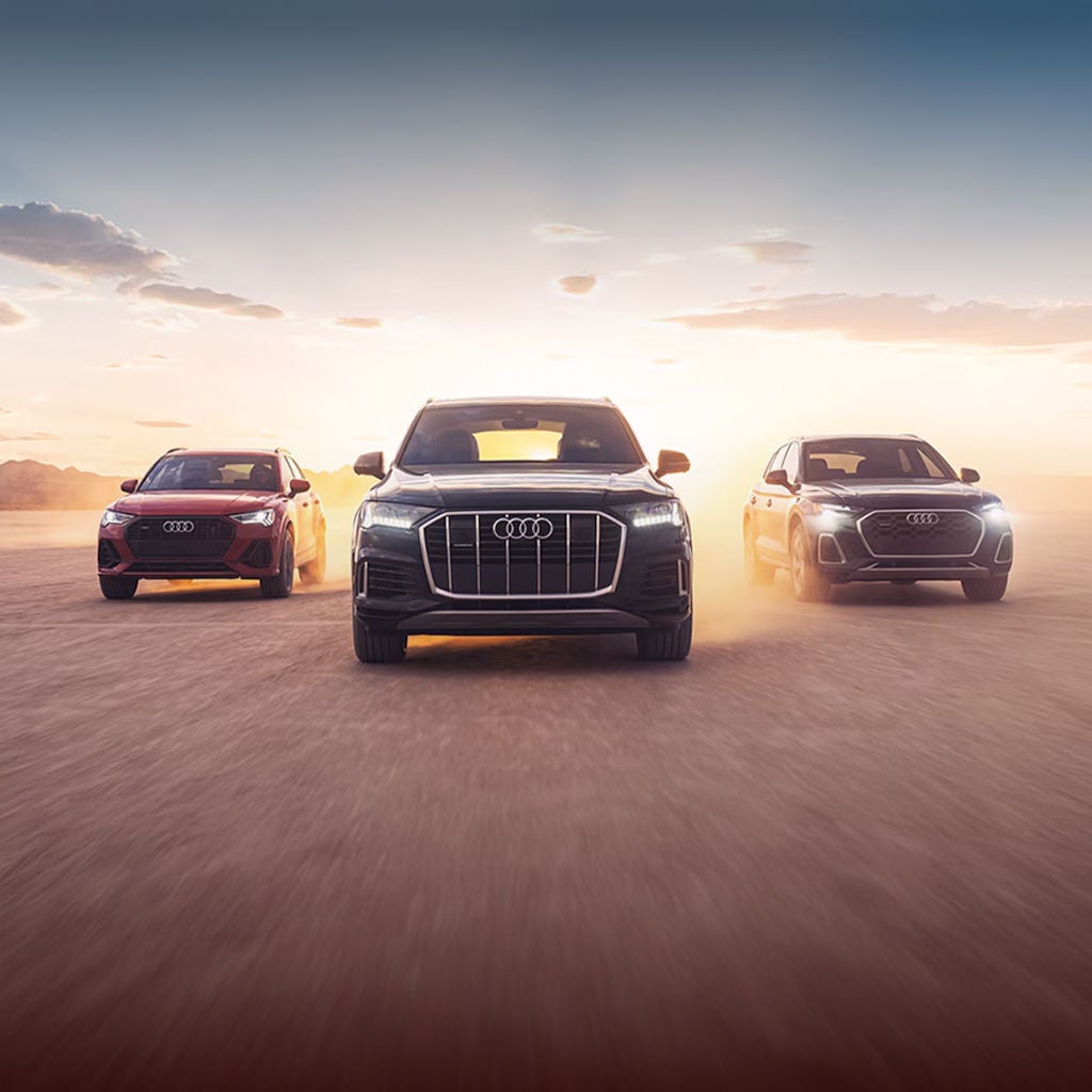 Right profile view of an Audi Q8 e-tron parked.