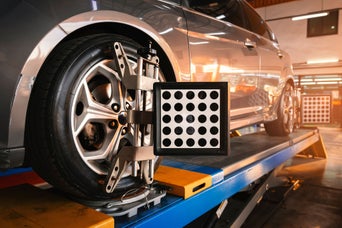 A vehicle on a life taking an alignment