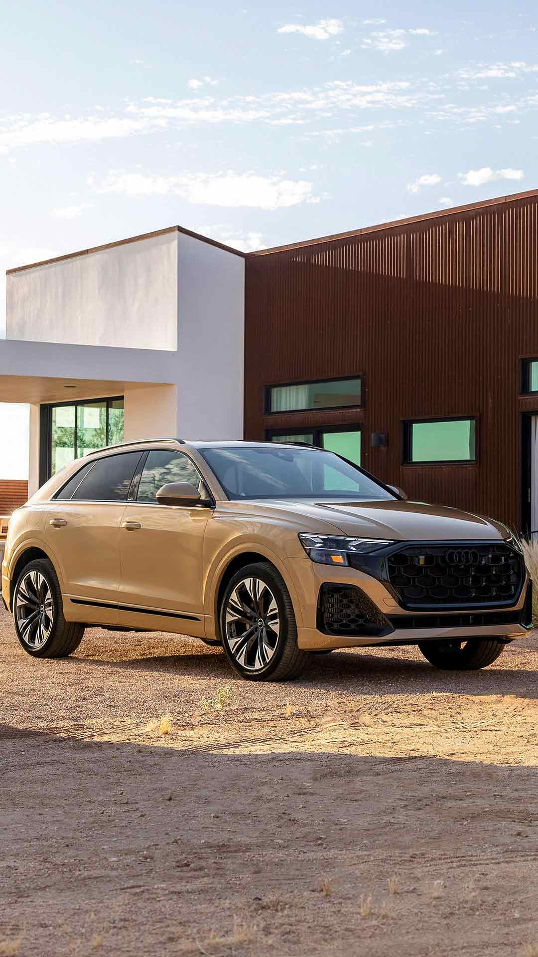 Three quarter view of an Audi Q8 SUV parked.